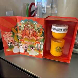 Sol de Janeiro Vibrant Orange Brazilian Bum Bum Cream Set with candle.